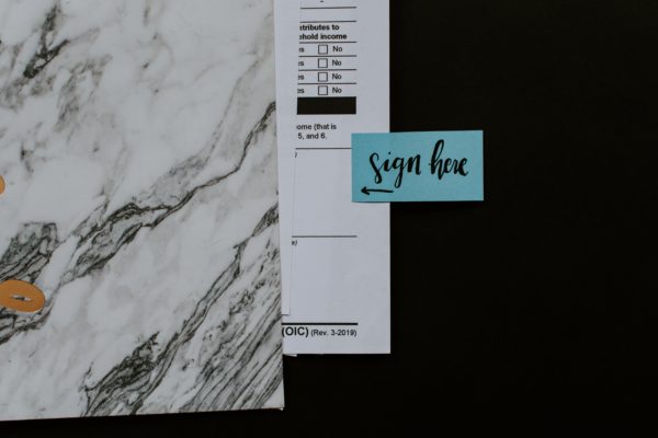 signing for closing costs during mortgage.