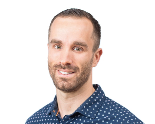 Matt Jackson of Mortgage Okanagan smiling headshot, wearing a navy blue shirt with small triangle pattern