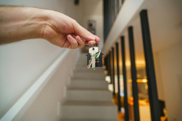 a set of house keys representing the path to home ownership 